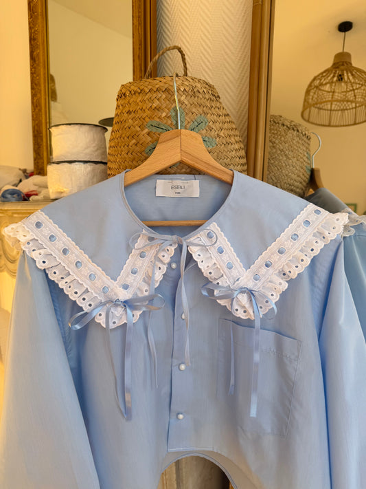 Blouse bleue col XL à rubans