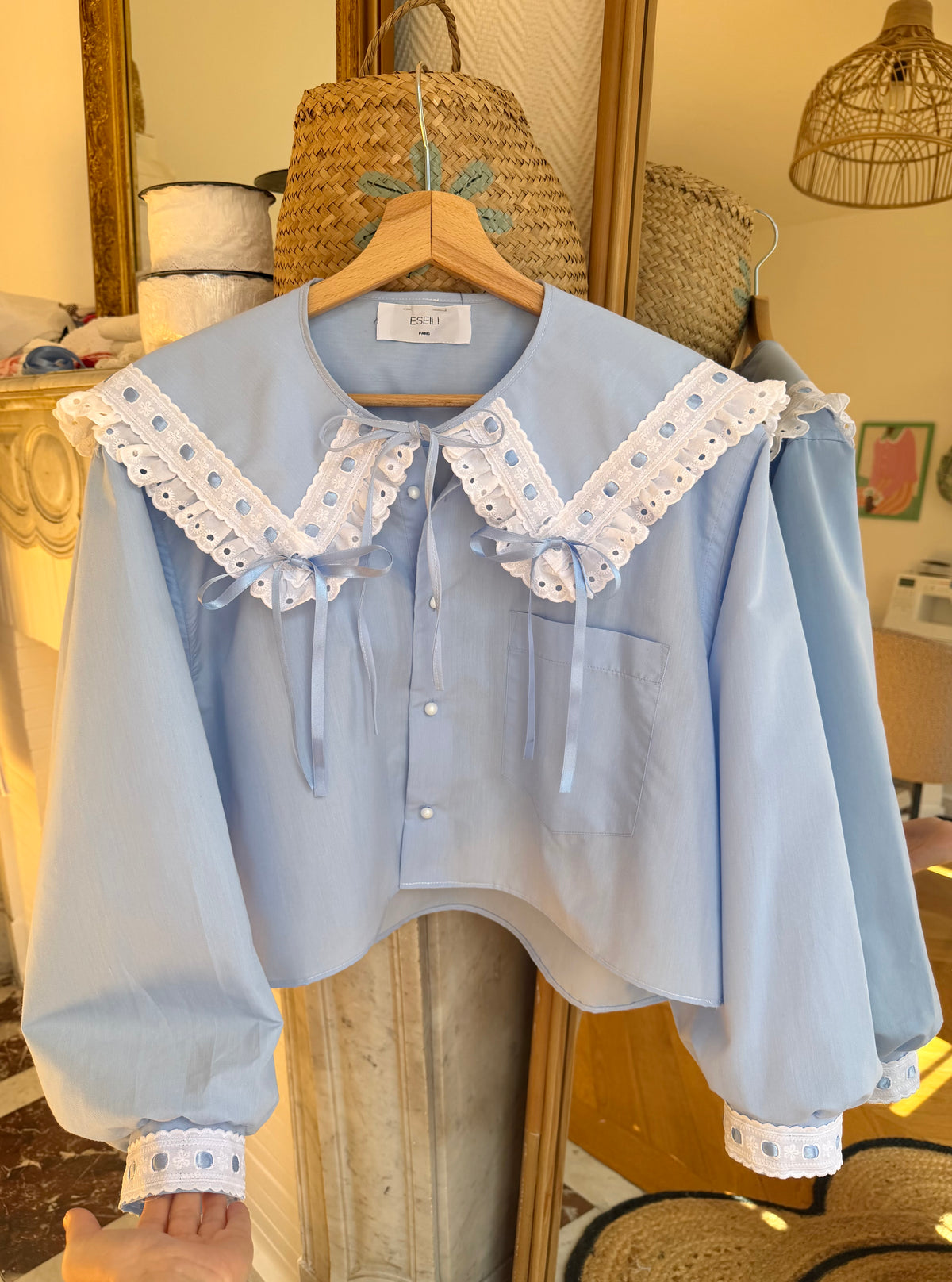 Blouse bleue col XL à rubans